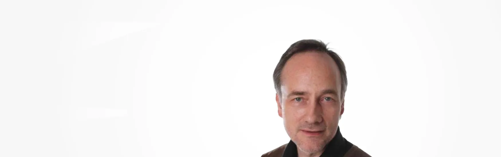 Dr.<br>Thomas Flietner